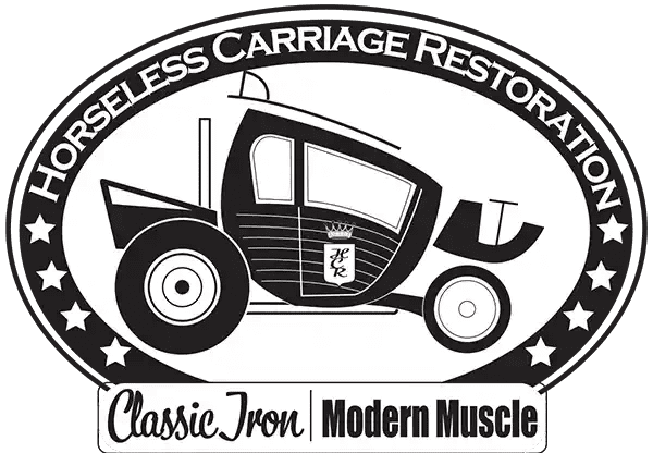 A black and white picture of an old car.